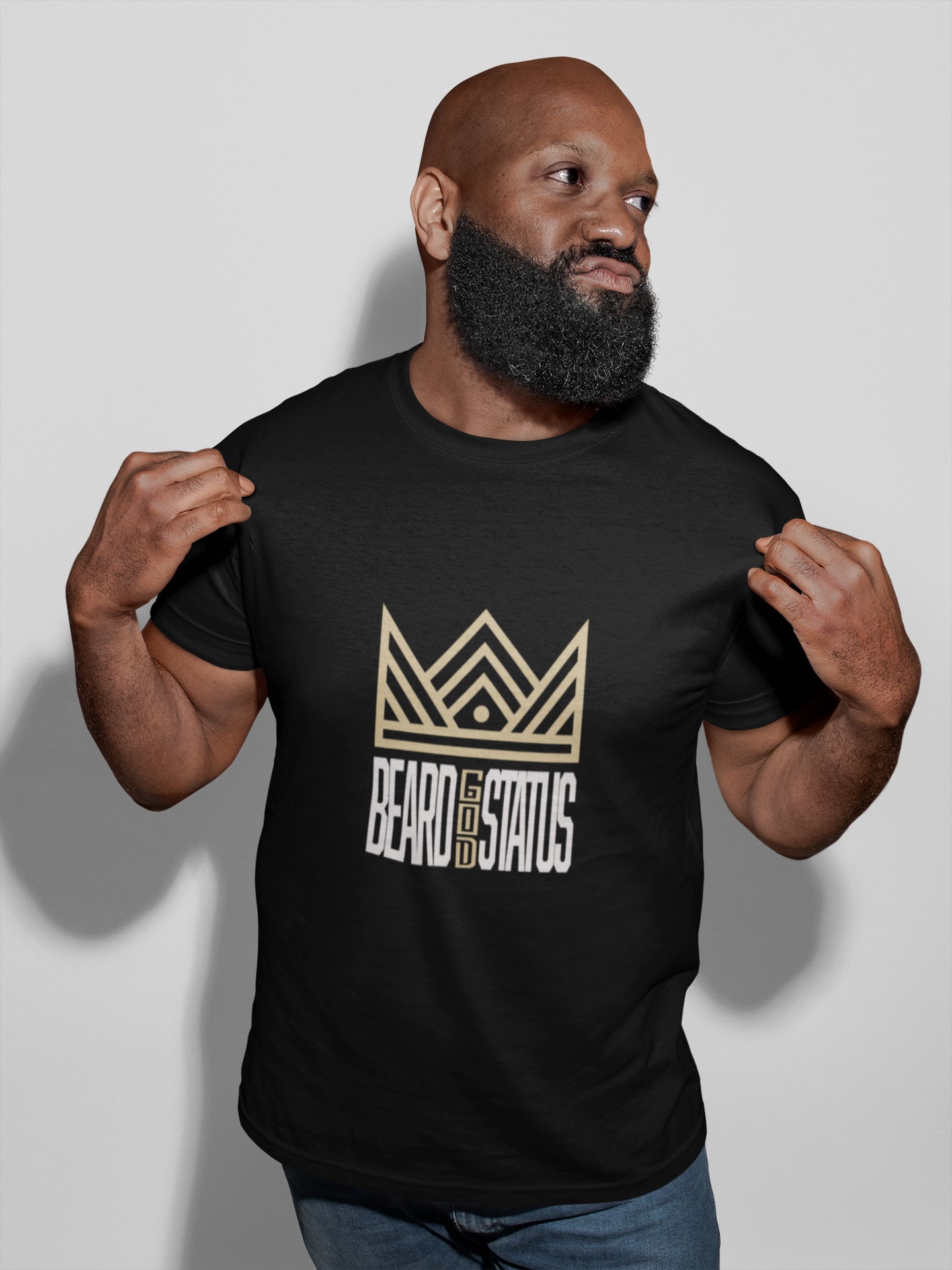 Black man with beard wearing Beard god status black tee